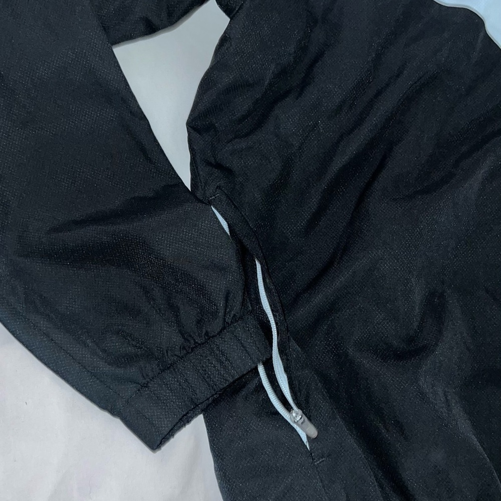 Lacoste Black and White Windbreaker with Chevron Design - Picture 2 of 10